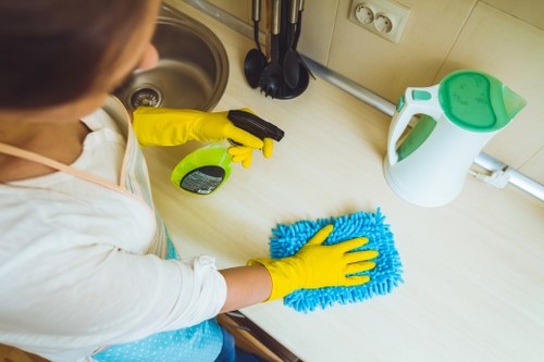 Detailed kitchen cleaning during a Belgravia move-out service